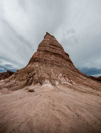 Rock formations in desert against sky