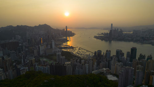 High angle view of cityscape against sky during sunset