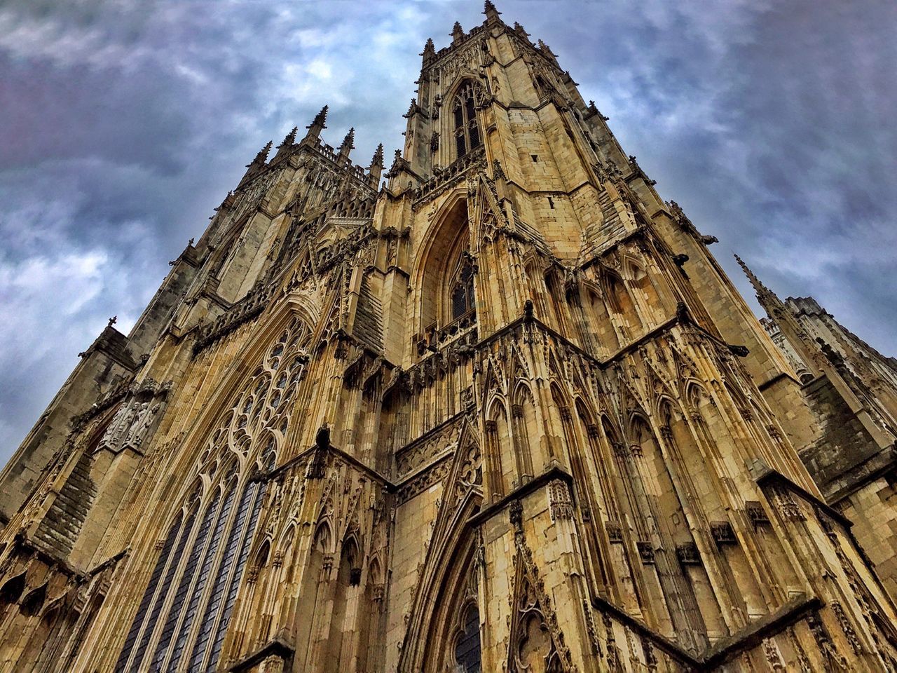 low angle view, sky, architecture, built structure, building exterior, no people, pattern, outdoors, cloud - sky, day