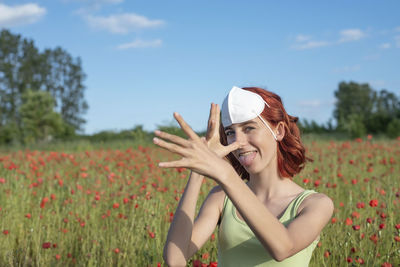 Young woman holding flower