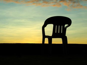 Silhouette horse against sky during sunset