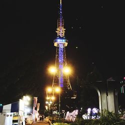 Low angle view of tower at night