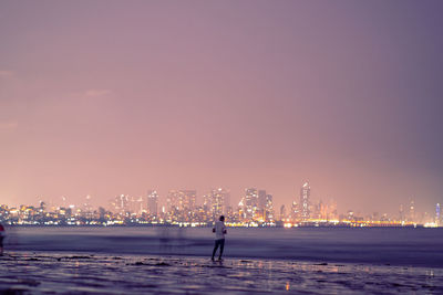 View of city at sunset