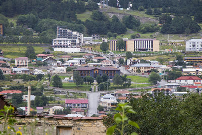 City view of stepantsminda, georgia. old houses and mountain view.