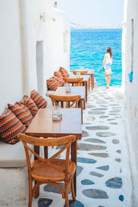 Woman relaxing on table at beach