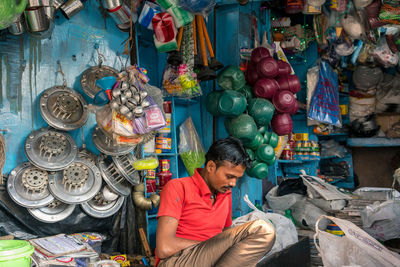 Man working at market stall