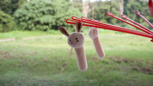 Close-up of stuffed toy on field