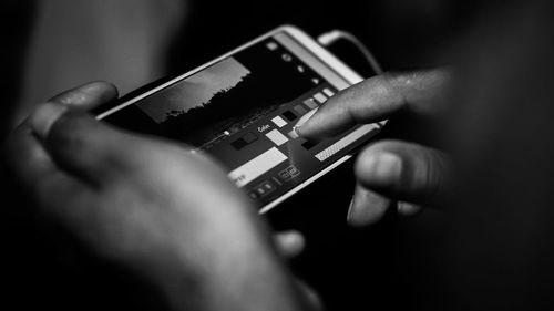 Close-up of person using mobile phone