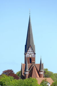 Low angle view of traditional building against clear sky