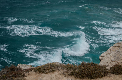 High angle view of waves in sea