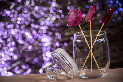 Close-up of glass jar on table