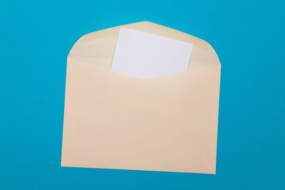 Directly above shot of adhesive notes on blue background
