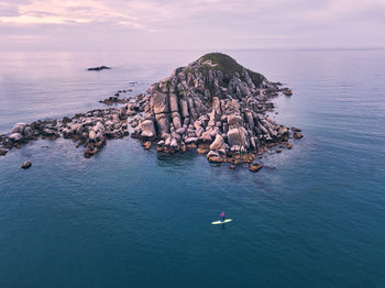 Aerial view of sup surfer ,triozerye, primorsky region, russia