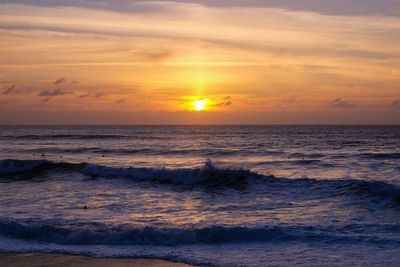 Scenic view of sea at sunset