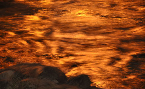 Low angle view of dramatic sky at night