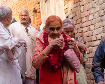 Group of people against the wall