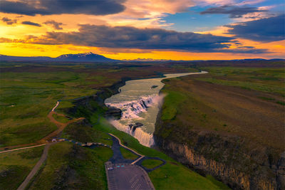 Scenic view of landscape against sky during sunset