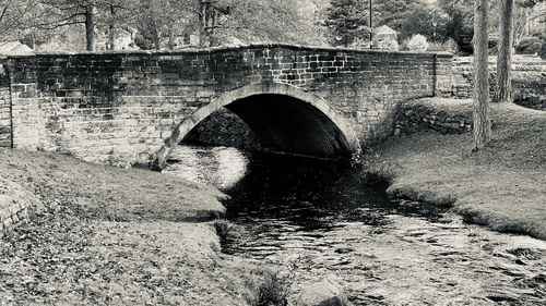 Arch bridge over river