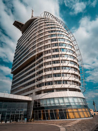 Low angle view of modern building against sky