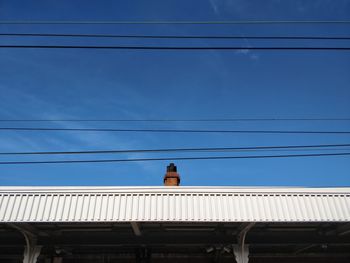 Low angle view of building against blue sky