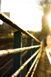 Close-up of railing on railway bridge