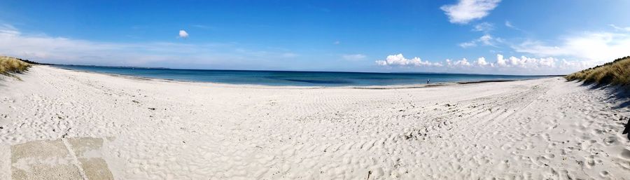 Scenic view of beach against sky