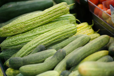 Close-up of green for sale at market stall