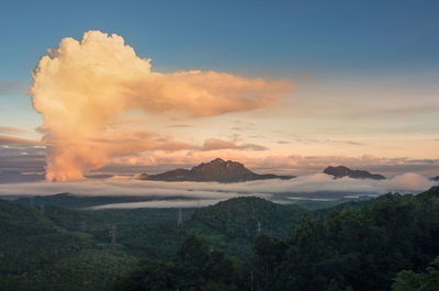 Scenic view of mountains against sky during sunset