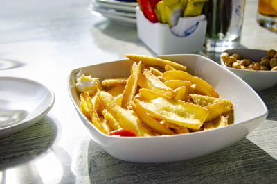 A close up shot of fries on the table