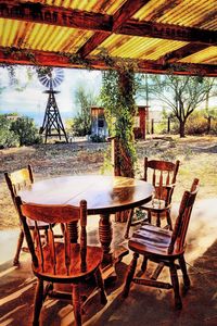 Empty chairs in park