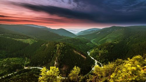 Scenic view of landscape against sky during sunset