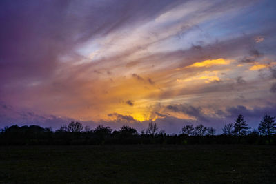 Scenic view of silhouette landscape against sky during sunset