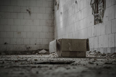 Damaged wall in abandoned building