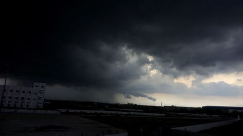 Built structure against cloudy sky