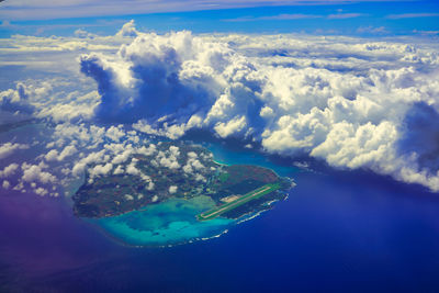 Aerial view of sea and island against sky