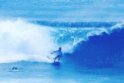 Man surfing in sea