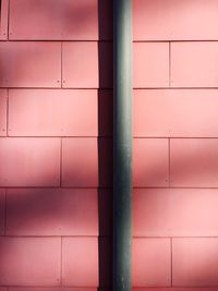 Pipe against coral wall