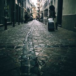 Cobblestone street in city