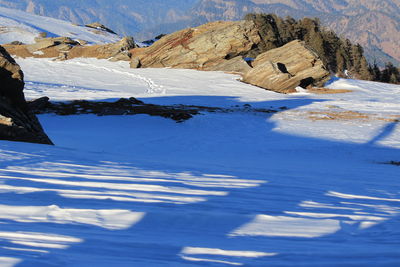 Scenic view of mountains against sky during winter