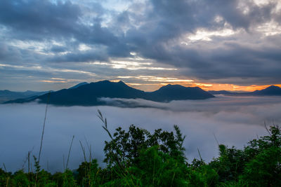 Scenic view of mountains against sky during sunset