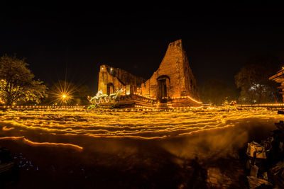 Illuminated historic building against sky at night