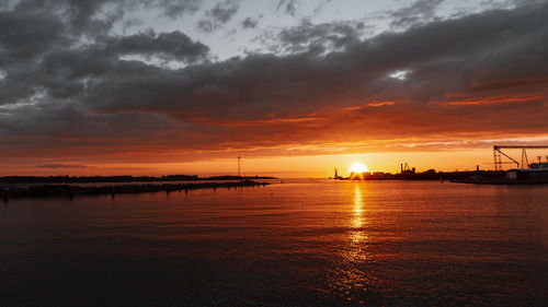 Scenic view of sea against sky during sunset