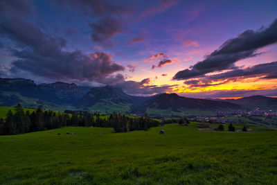 Scenic view of landscape against sky during sunset