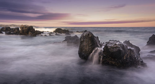 Scenic view of sea against sky during sunset