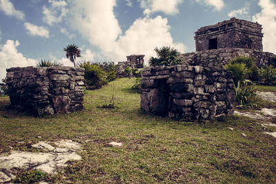 Stack of old ruins against sky