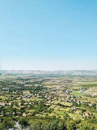 Scenic view of field against clear sky