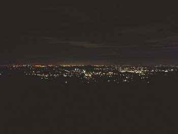 Illuminated cityscape at night