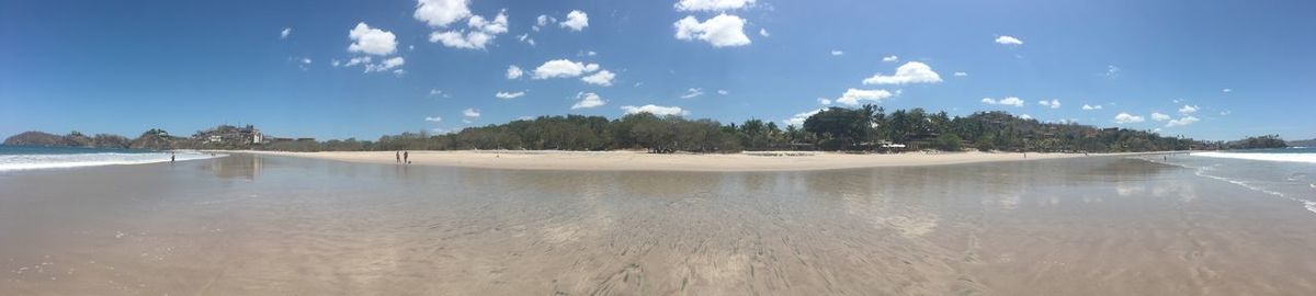 Panoramic view of beach against sky