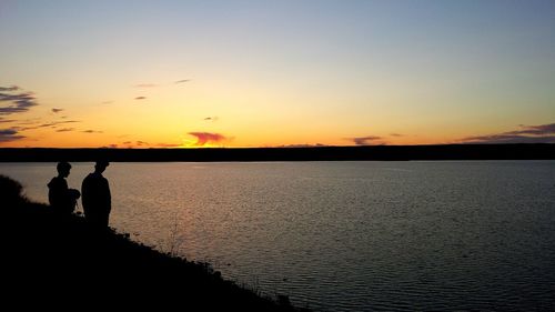 Scenic view of sea at sunset