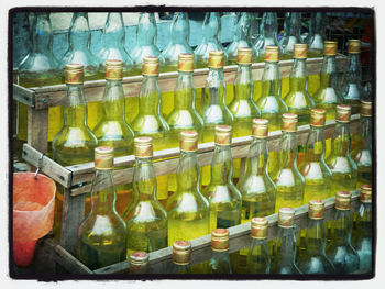 Close-up of glass bottles in store